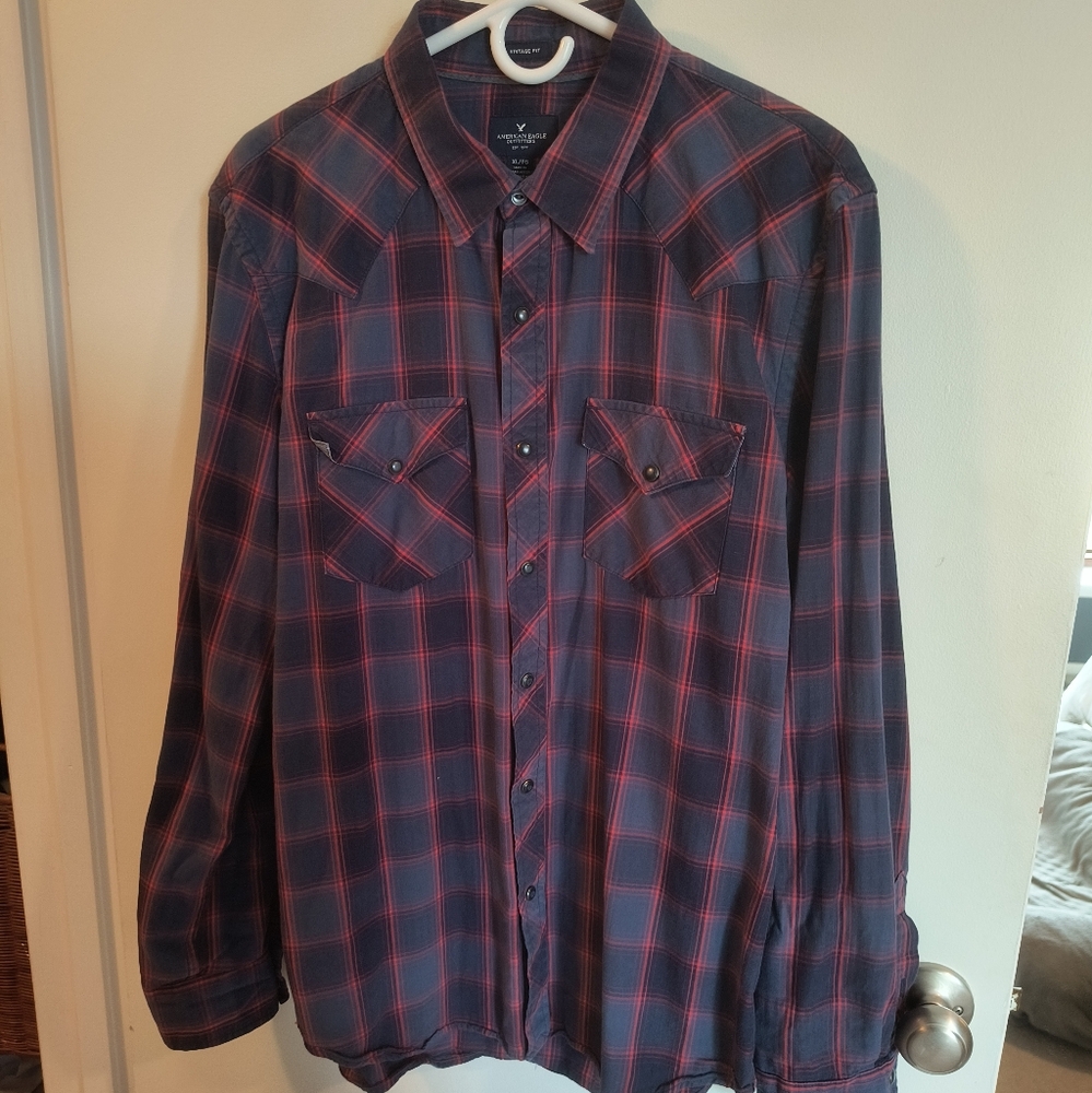 AE button down